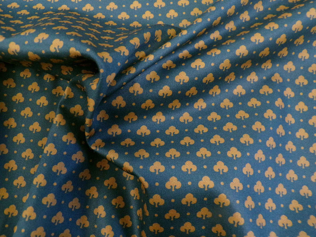 Mako sateen, fabric by the meter, cotton, “Clover” pattern, dark blue/light brown, scattered pattern, navy, tan, lily, cotton sateen, bedding, shiny, shirts, blouses