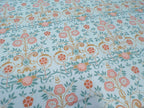 Mako satin fabric by the meter, “Cottage Garden” design, “Garden Pond” colorway, light blue, aqua, floral pattern, turquoise, pink, brown, glossy cotton satin, bed linen, traditional clothing, dirndl dresses
