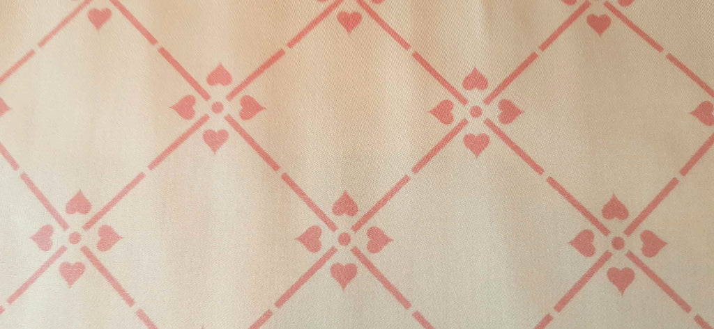 Mako-Satin, Meterware, Motiv Raute, Vanille-Altrosa, glänzend, Baumwollsatin, elegante Kleider, Bettwäsche, Trachten, Dirndl Kreuzblume, geometrisch hellgelb, rosa