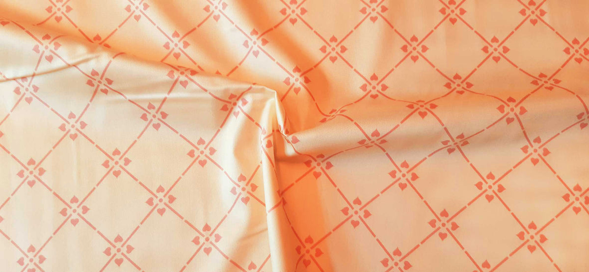 Mako-Satin, Meterware, Motiv Raute, Vanille-Altrosa, glänzend, Baumwollsatin, elegante Kleider, Bettwäsche, Trachten, Dirndl Kreuzblume, geometrisch hellgelb, rosa