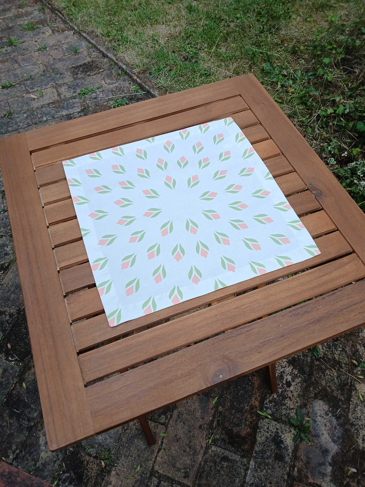Cloth napkin, 40x40cm, 100% cotton, white, crocuses, light green/pink, with 25mm envelope hem, placemat