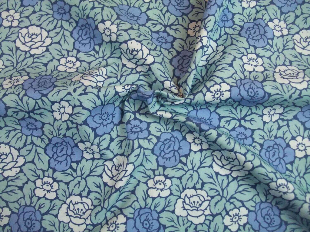 Popeline, Meterware, Baumwollstoff, Rosenmuster, blau türkis, bio, GOTS, Blusenstoff, Hemdenstoff, Futterstoff, Webware, Trachten, Dirndl, Patchworkstoff , Grundton Navy