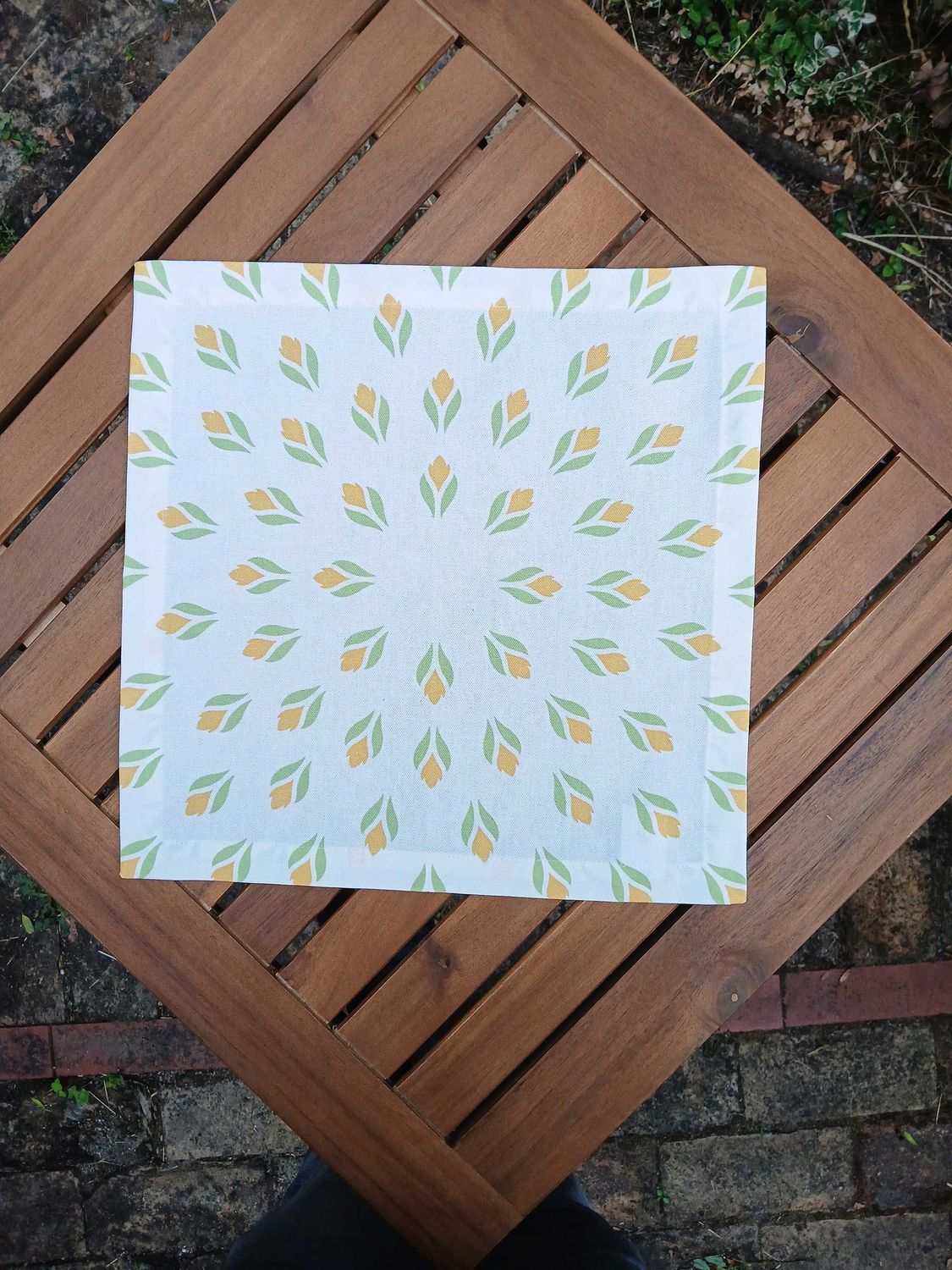 Cloth napkin, 40x40cm, 100% cotton, white, crocuses, light green/yellow, with 25mm envelope hem, placemat