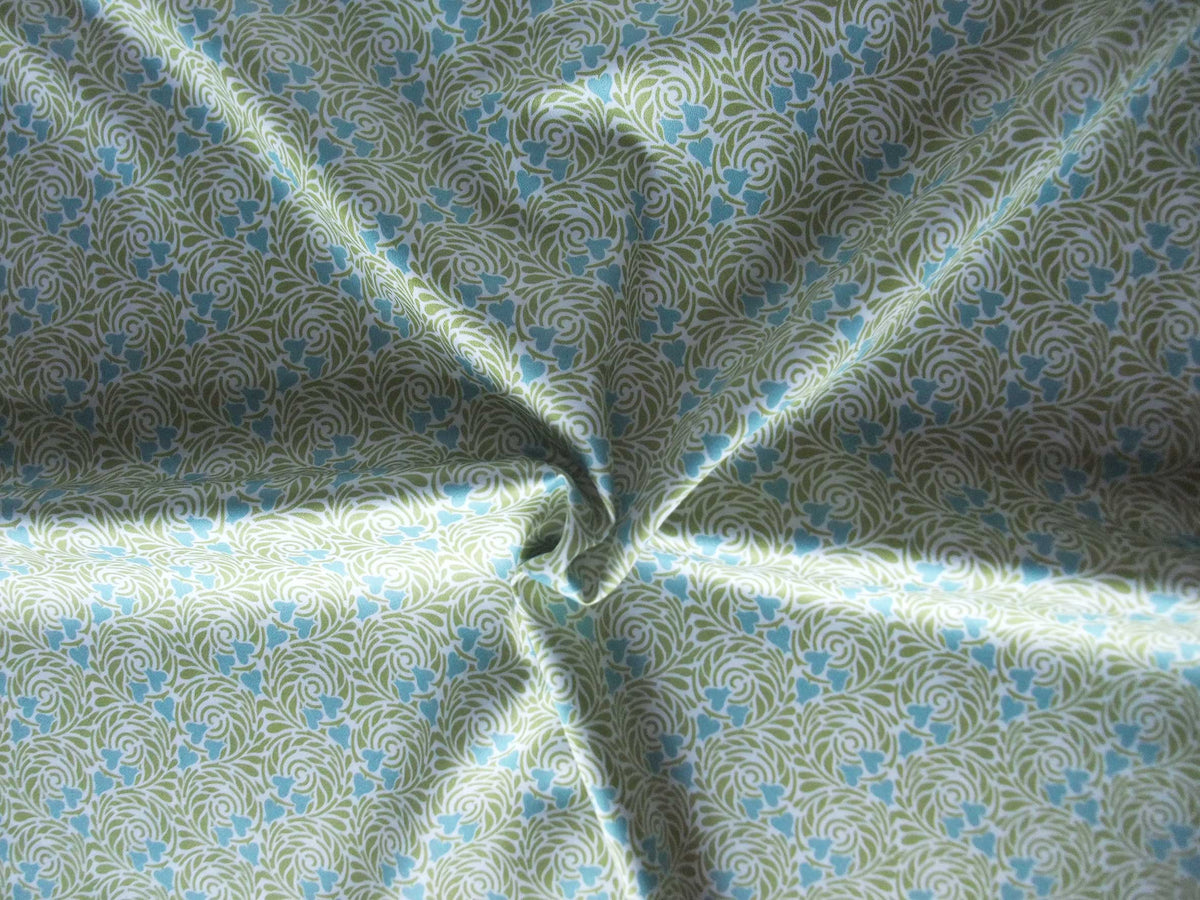 Mako-Satin, Meterware, Baumwolle,  Motiv "Rabenwiese" grün/wasserblau, türkis, aqua, Spiralen, Herzen, Baumwollsatin, für Bettwäsche, elegante Kleidung, Hemden, Kleider